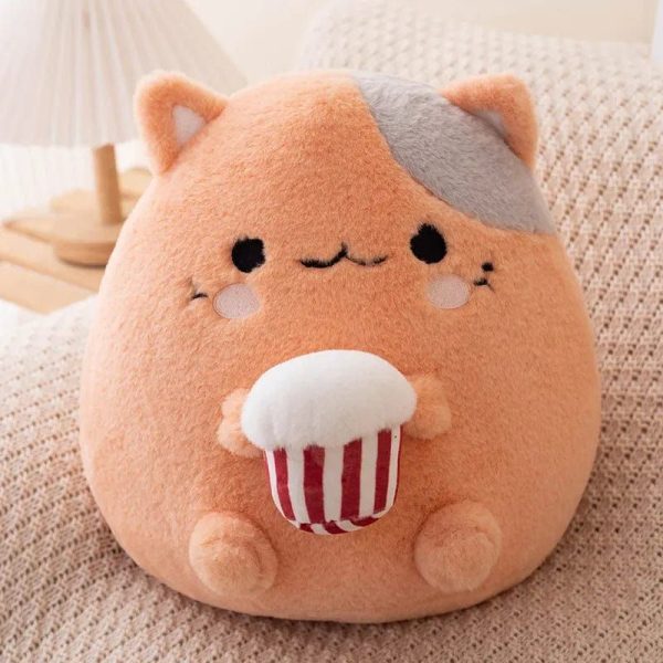 peluche chat qui mange du popcorn