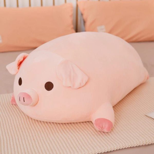 peluche cochon rose éveillé