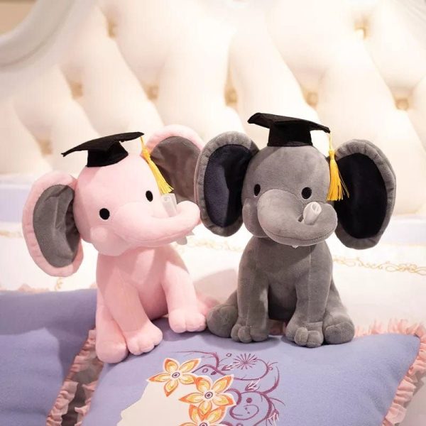 peluche éléphant diplômé avec sa trompe tordue