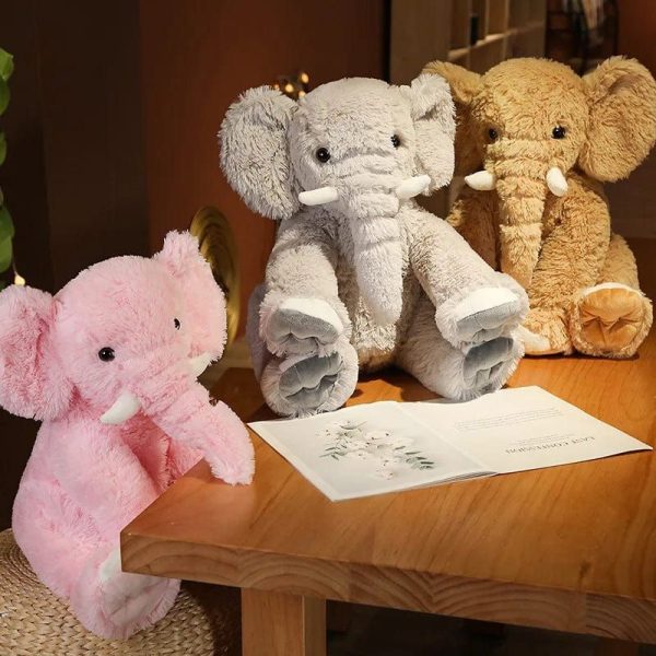 peluche éléphant poilu aux petites défenses