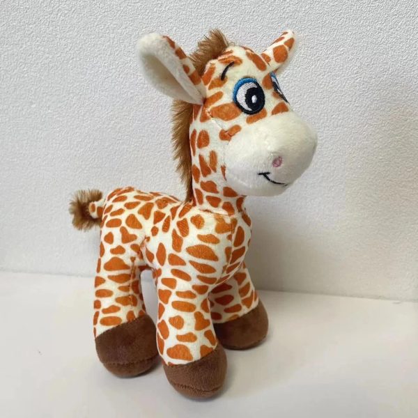 peluche girafe aux gros yeux