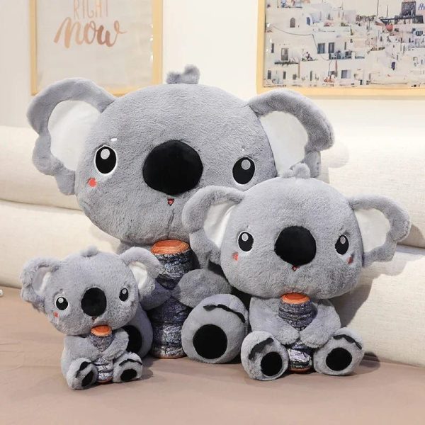 peluche koala qui câline son bois