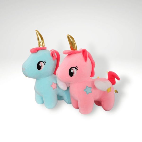 peluche licorne avec une corne dorée