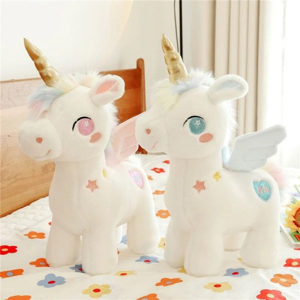 peluche licorne blanche étoilée avec ailes