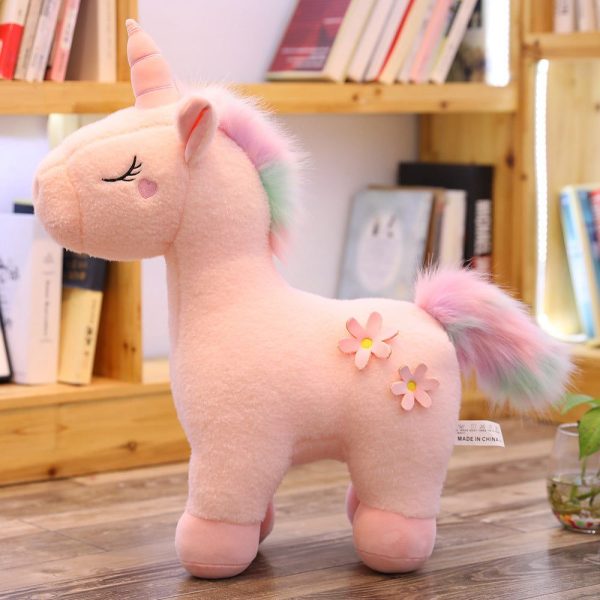 peluche licorne blanche fleurie