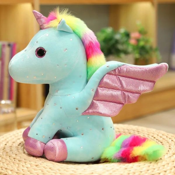peluche licorne bleu à crinière arc-en-ciel magique