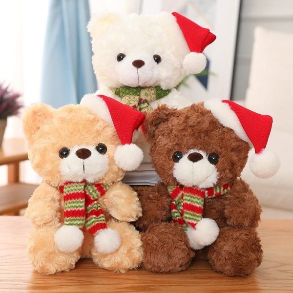peluche ourson noël avec un bonnet rouge