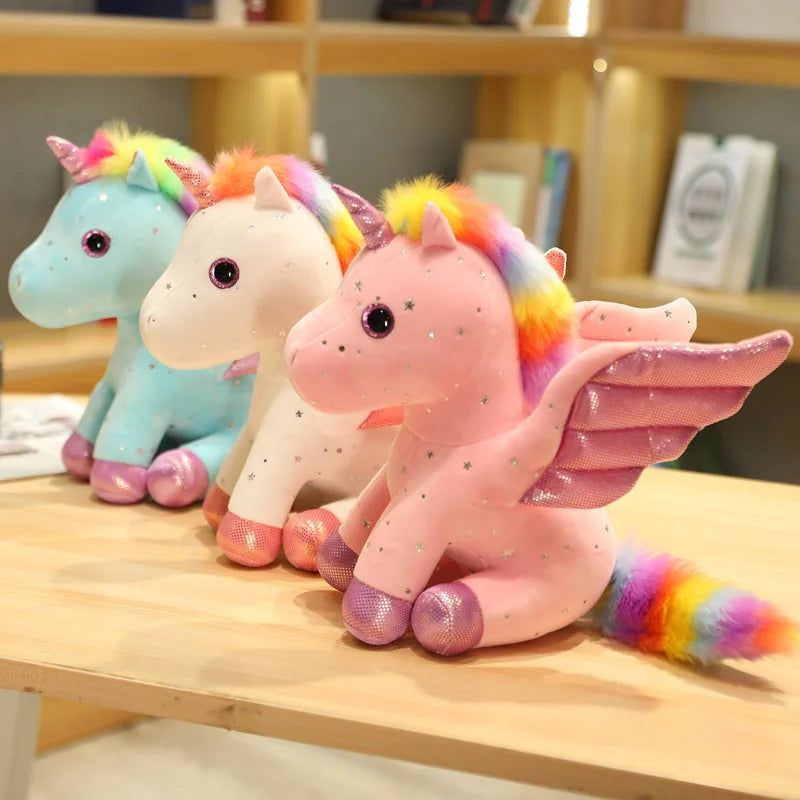 peluche rose licorne avec crinière colorée