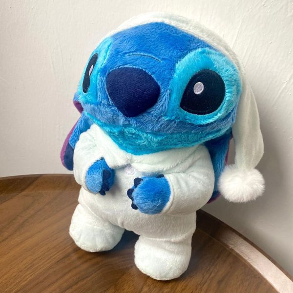 peluche Stitch en pyjama bleu