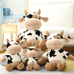 peluche vache douce qui tire la langue